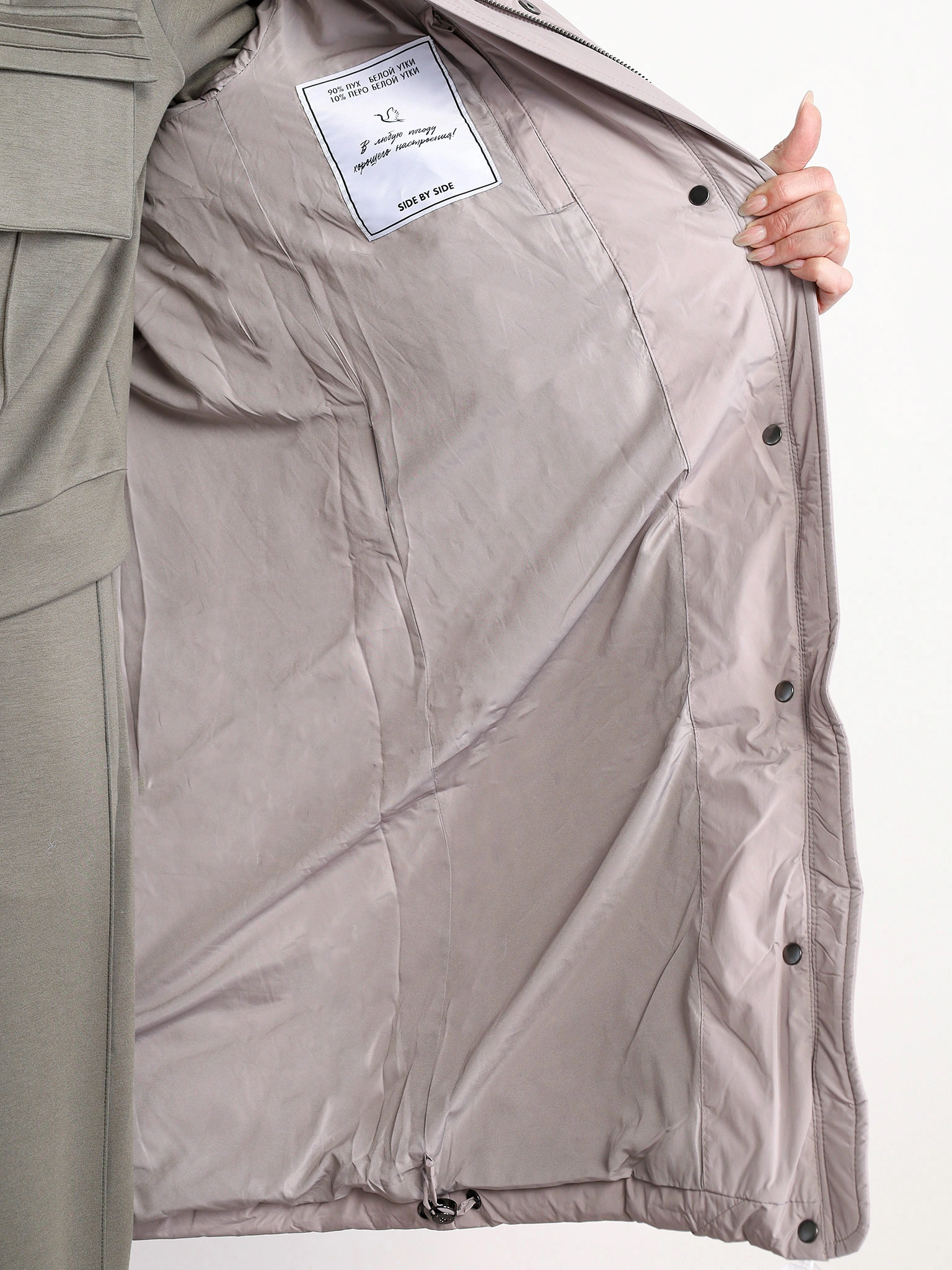 Пуховик бежевого цвета с двойным капюшоном